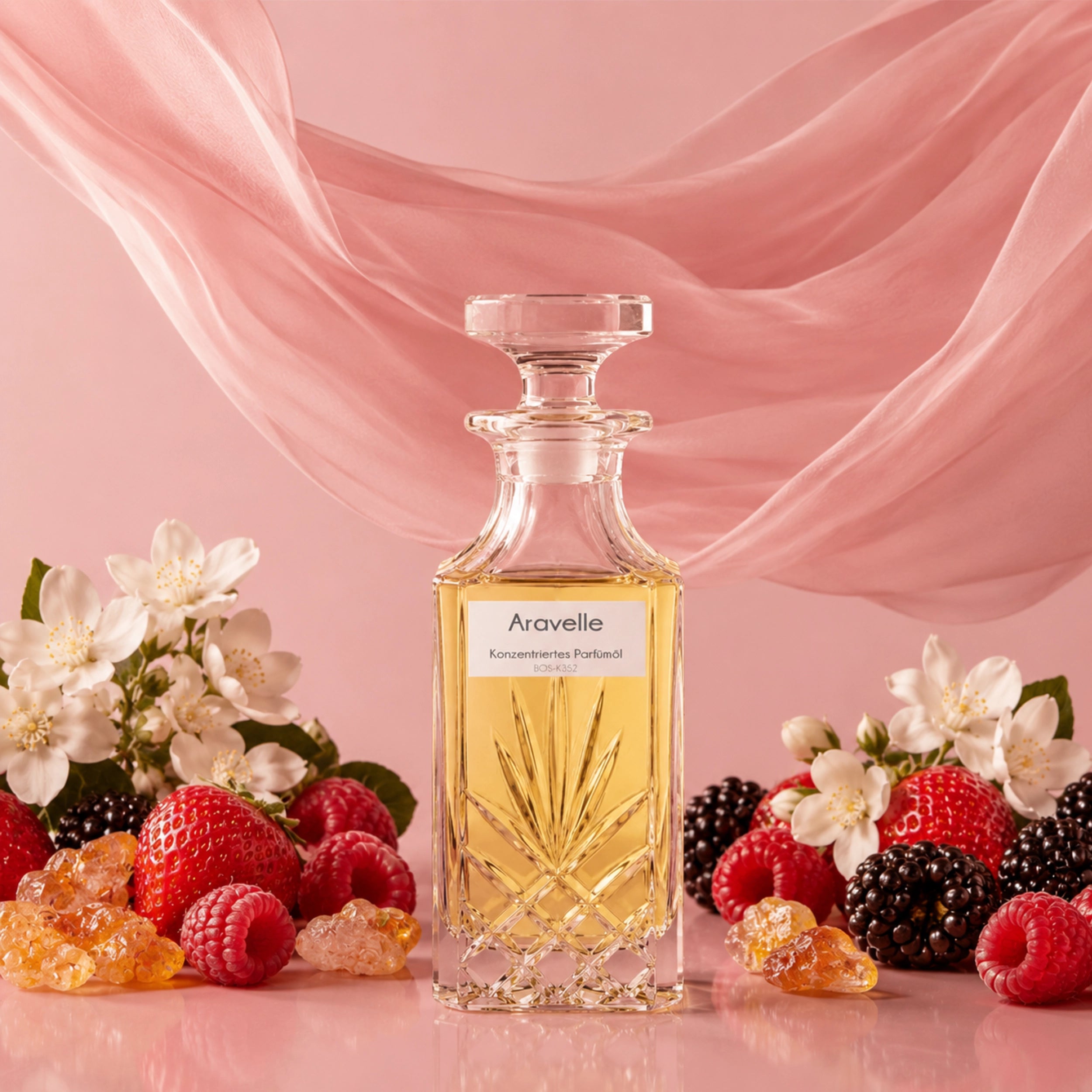 Aravelle Parfümöl für Damen mit Brombeeren, Erdbeeren, Himbeeren, Jasmin und Benzoe auf puderrosa Hintergrund