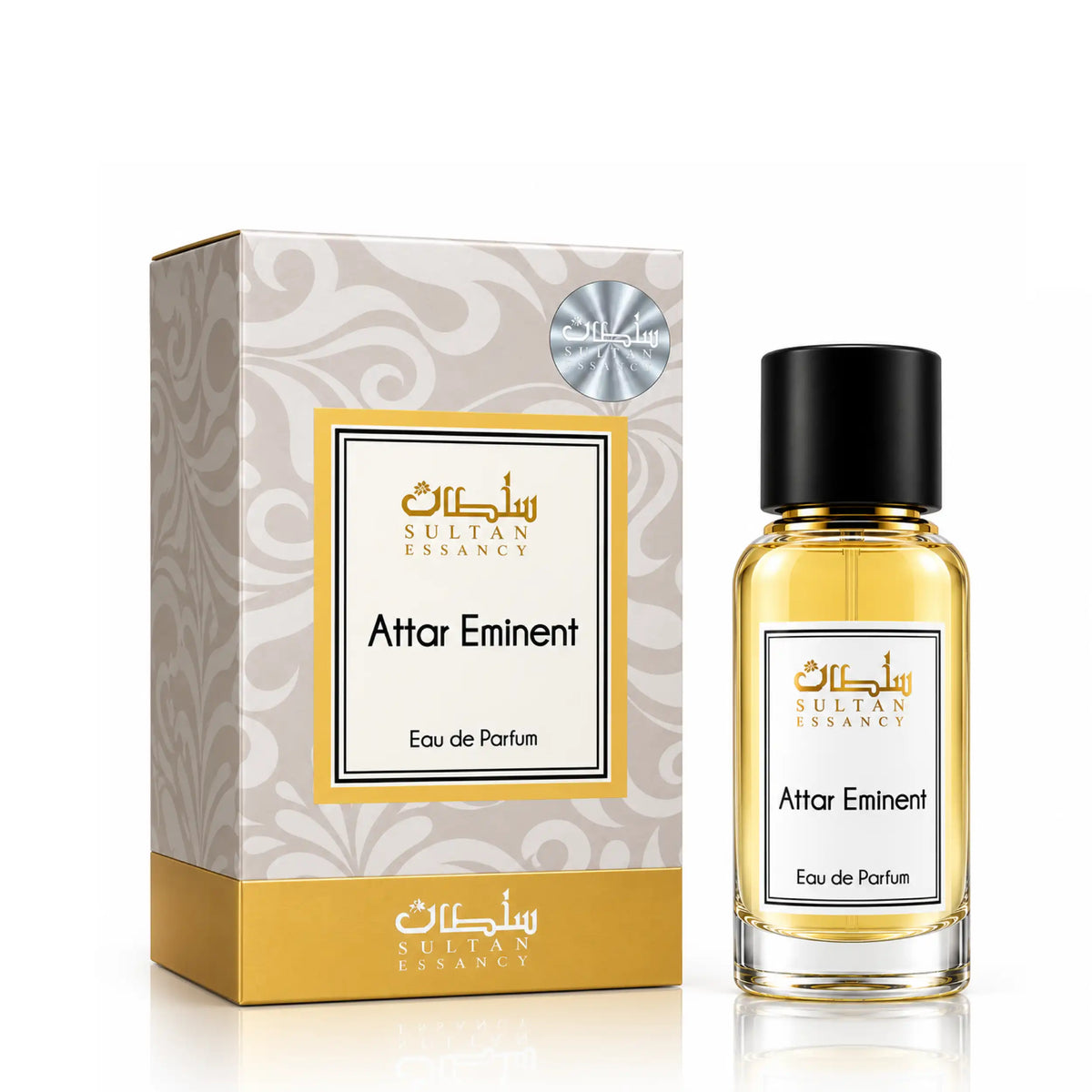 Attar Eminent Eau de Parfum von Sultan Essancy – transparenter Flakon mit goldgelbem Parfüm und schwarzem Verschluss neben der cremefarbenen, goldverzierten Verpackung.