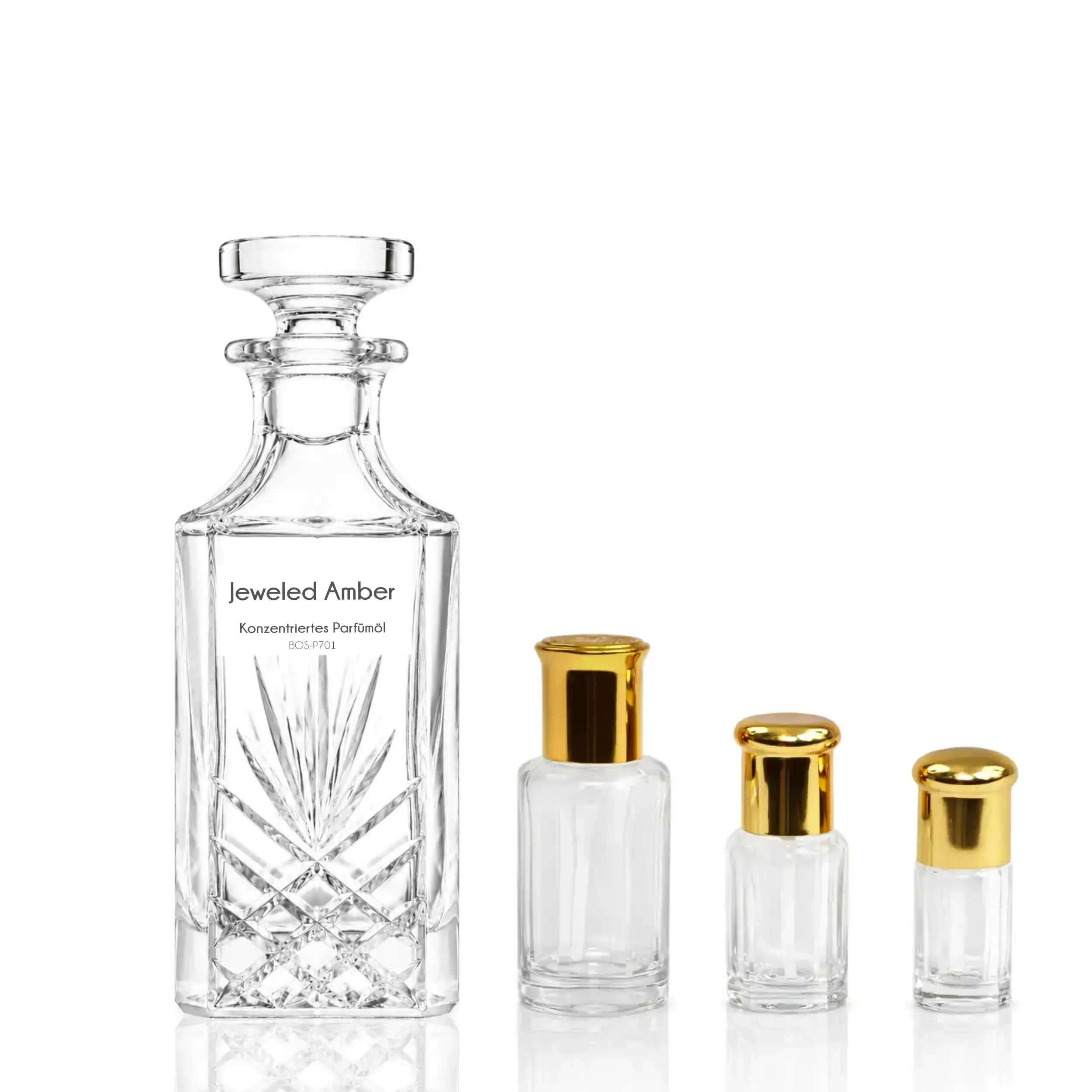 Jeweled Amber Parfümöl von Sultan Essancy mit transparentem Glasflakon und verschiedenen Größenvarianten auf weißem Hintergrund