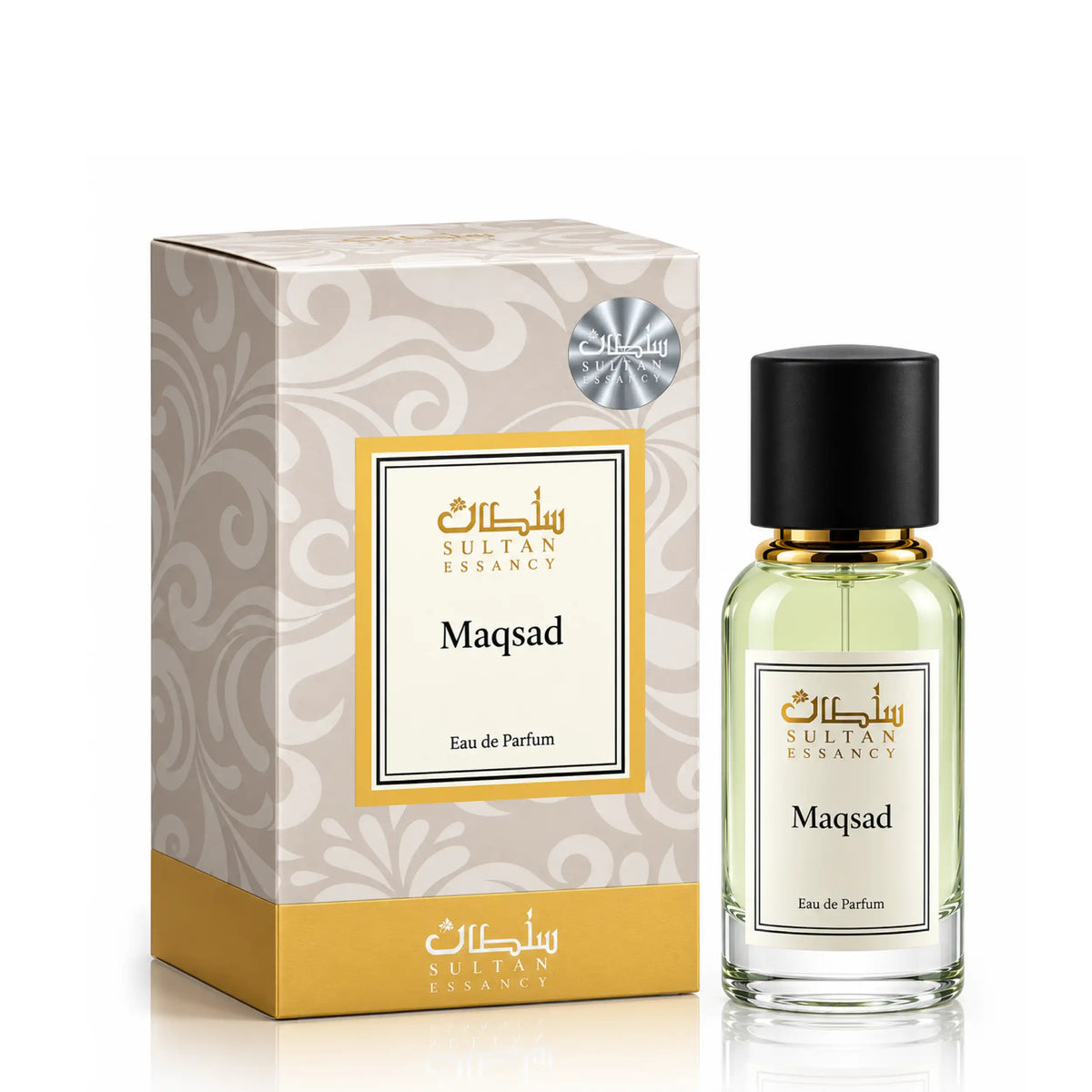 Maqsad von Sultan Essancy – Unisex Eau de Parfum im transparenten Glasflakon mit schwarzem Verschluss, neben der eleganten creme-goldenen Verpackung.