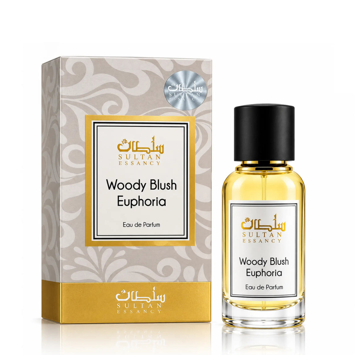 Woody Blush Euphoria Eau de Parfum für Damen von Sultan Essancy – Glasflakon mit goldgelber Flüssigkeit und schwarzem Verschluss neben der creme-goldenen Originalverpackung.